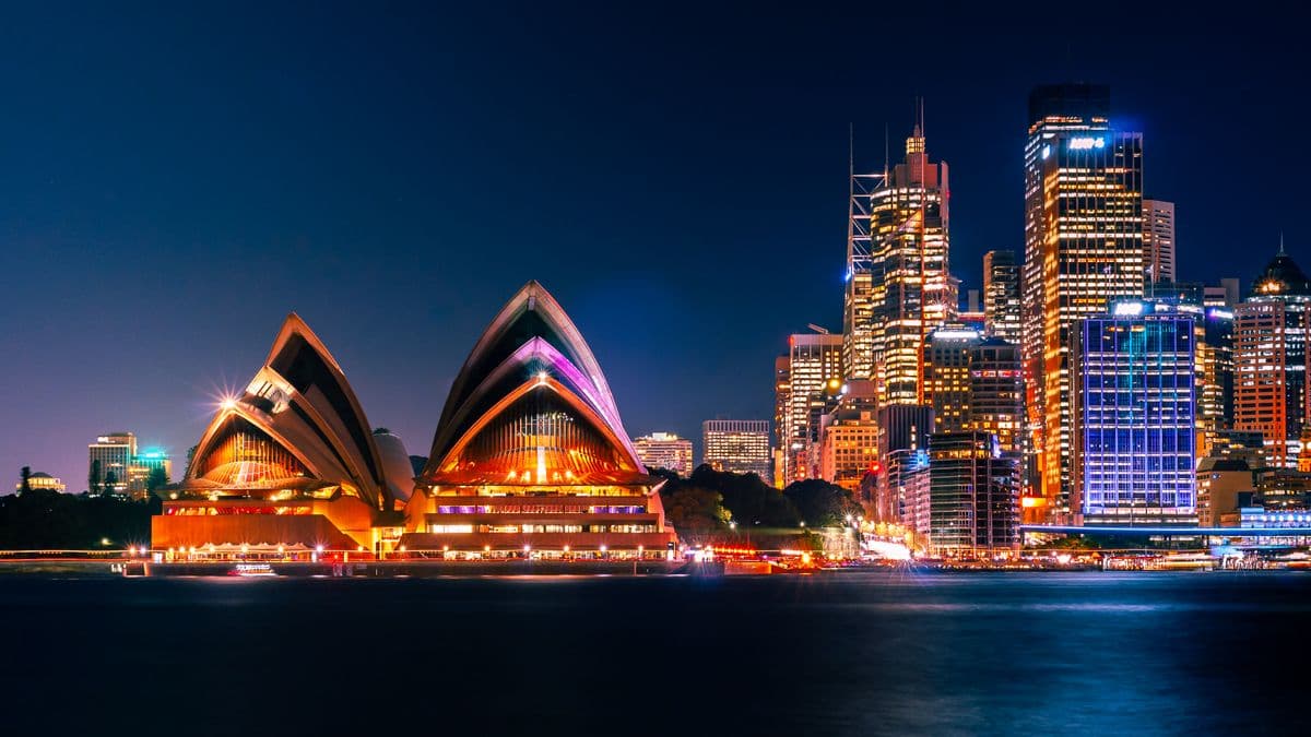Sydney Opera House and the city lit up at night